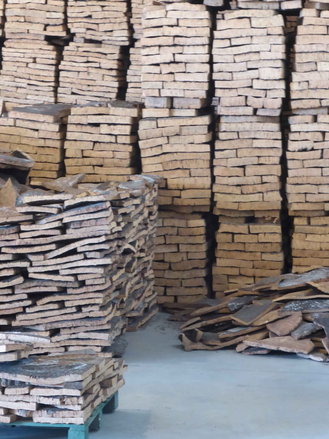 Cork sorted into piles in Alentejo, Portugal by J.C. Lawrence