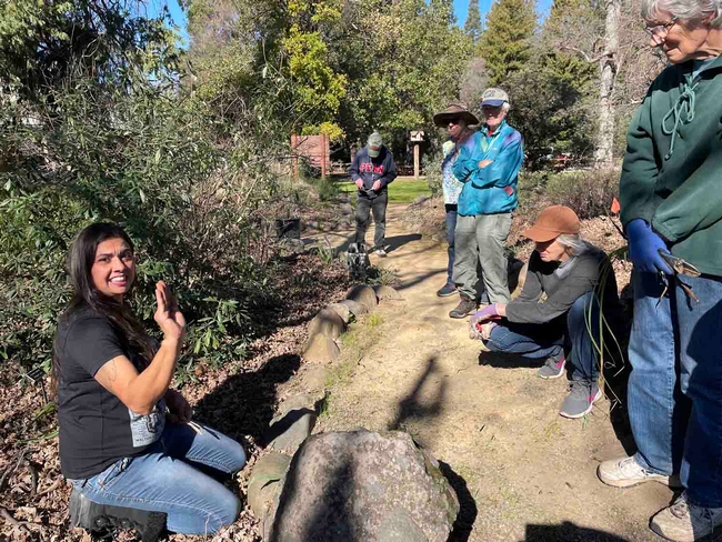 Ali Meders-Knight talks about Traditional Ecological Knowledge with volunteers at Alice Hecker Memorial Garden at Chico Creek Nature Center, Deb Halfpenny.
