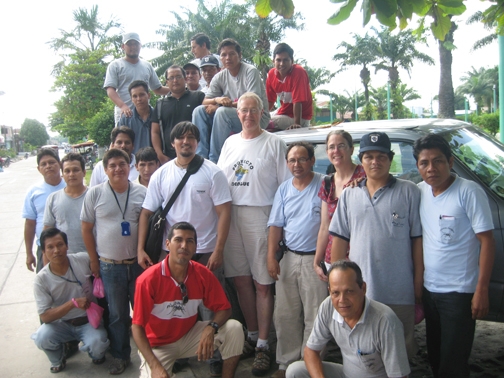 Medical entomologist Thomas Scott (center, second row) and co-authors Helvio Astete (next to him, light blue shirt) and Amy Morrison (red blouse).
