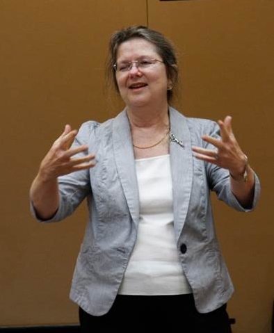Mary Lou Flint presenting a lecture.