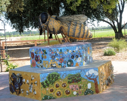 This bee sculpture, the work of Donna Billick of Davis, is one of the highlights of the Häagen-Dazs Honey Bee Haven. Wells Fargo Bank provided the funding for the sculpture and is sponsoring the grand opening celebration.  (Photo by Kathy Keatley Garvey)