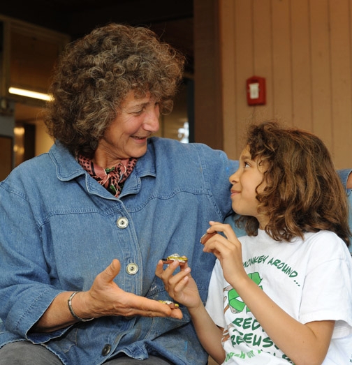 Entomologist-artist Diane Ullman admires the work of Aleta Ballinger, 8, of Davis. Ullman and Donna Billick direct the UC Davis Art/Science Fusion Program. (Photo by Kathy Keatley Garvey)