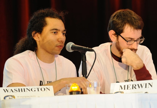 Ralph Washington (left) of the UC Davis Linnaean Team correctly answers a question during the competition with Ohio State. At right is Andrew Merwin