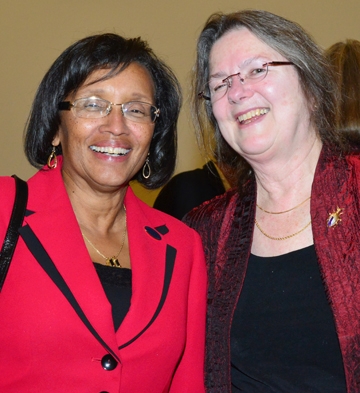 Helene Dillard (left), dean of the UC Davis College of Agricultural and Environmental Sciences, shares a moment with Mary Lou Flint.