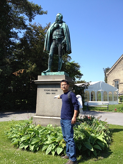 Shih-Wen Young co-juried the show. He is shown here in the Botanist Gardens, Copenhagen, Denmark.