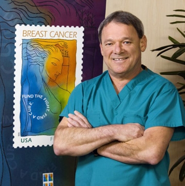 Dr. Ernie Bodai stands by the Breast Cancer Research Stamp, a project he spearheaded. He served as chief of surgery for Kaiser Permanente, Sacramento, for 15 years.