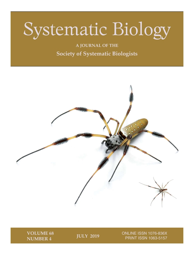 The cover of Journal of Systematic Biology features a photo of a golden orbweaver.