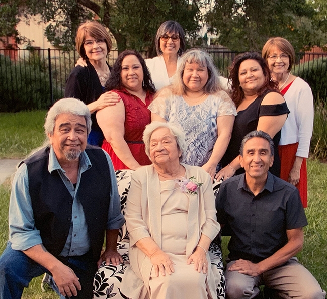 The Galvan family is close-knit. In front (from left) are Joaquin Galvan of Dixon, mother Lilia Galvan of Dixon, and Bonifacio Galvan of Sonora, known for the thriving company that he founded in his garage, Galvan Fly Feels. In the second row (from left) are Elvira Galvan Hack, Dixon; Sandra Galvan, Elmira, and Amanda Galvan, Dixon. In back (from left) are Lilia Felix, Washington state; Virginia 