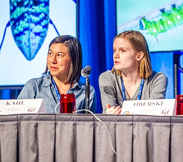 Hanna Kahl (left) and Jill Oberski of the UC Davis Linnaean Games Team listen to the question asked. (ESA Photo)