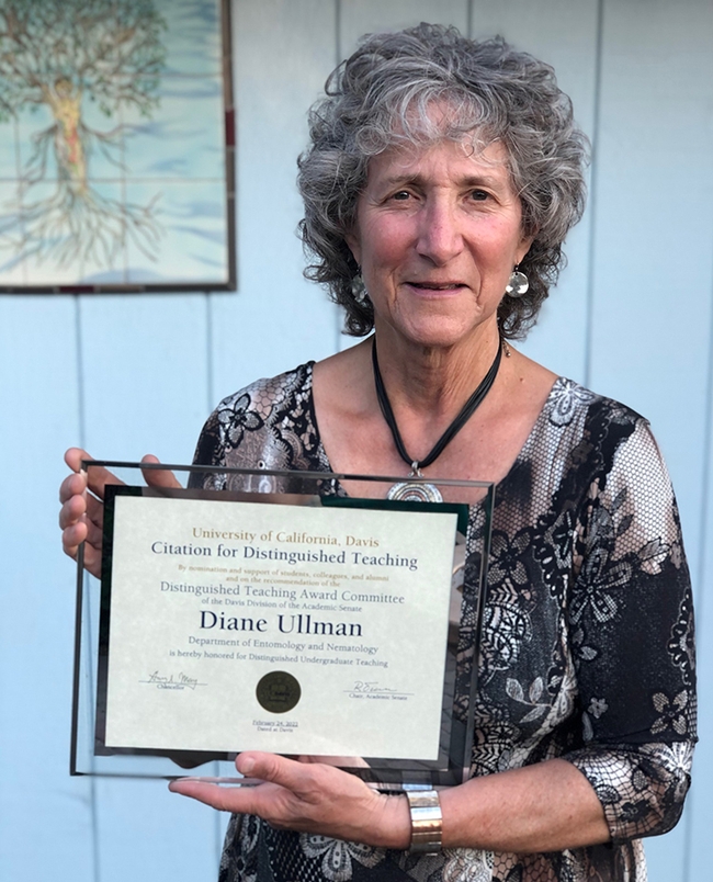 Professor Diane Ullman with award (Courtesy photo)