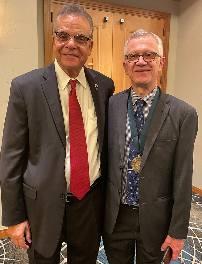 UC Davis distinguished professor Walter Leal (right) with Paul Sanberg, president of the National Academy of Inventors. (Courtesy Photo)