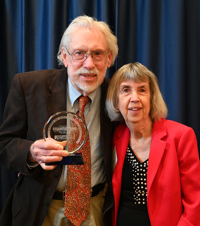 Bill Patterson and his wife, Doris Brown, with their Friends of the College plaque from the UC Davis College of Agricultural and Environmental Sciences. (Photo by Kathy Keatley Garvey)