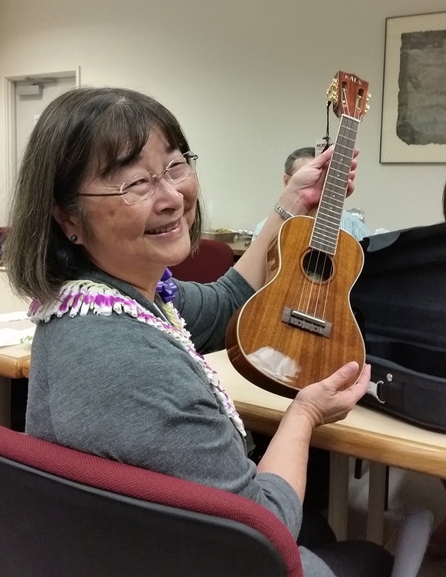 One of Shirley Gee's retirement gifts: a ukulele.