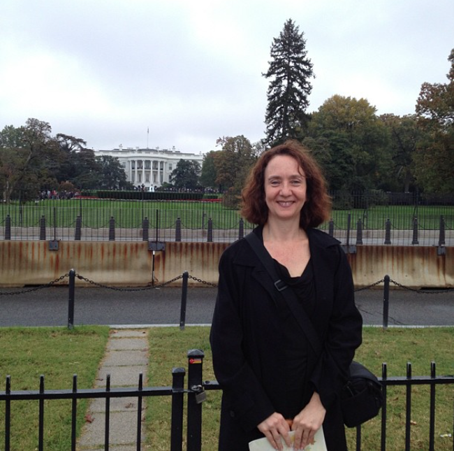 Surls poses with White House in the background