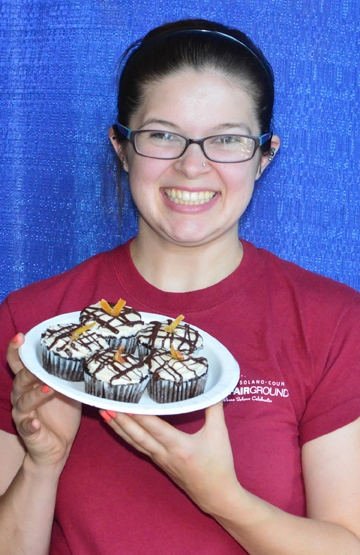 Julianna Payne with her gluten-free cupcakes. (Photo by Kathy Keatley Garvey)