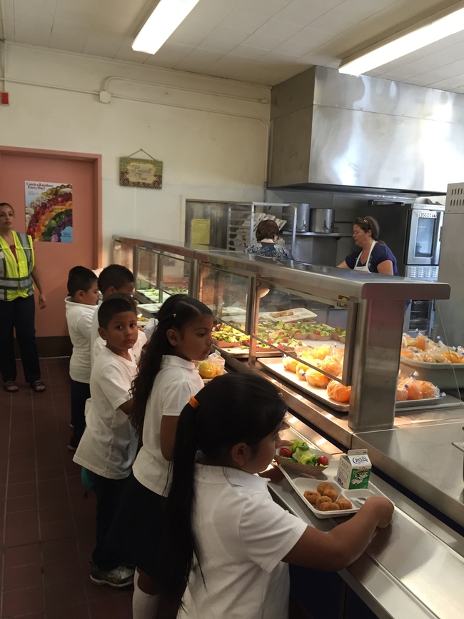 Children at Ygnacio Elementary School in Concord pick up lunch from a new serving counter.