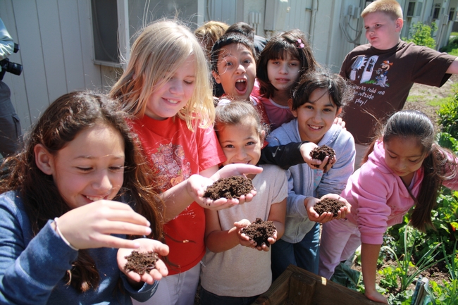 Encouraging children to connect with food through a school garden is a way to establish healthier eating habits.