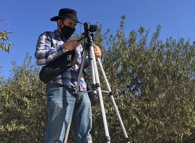 UCCE Community Education Specialist Julio Contreras films cover crop seeding