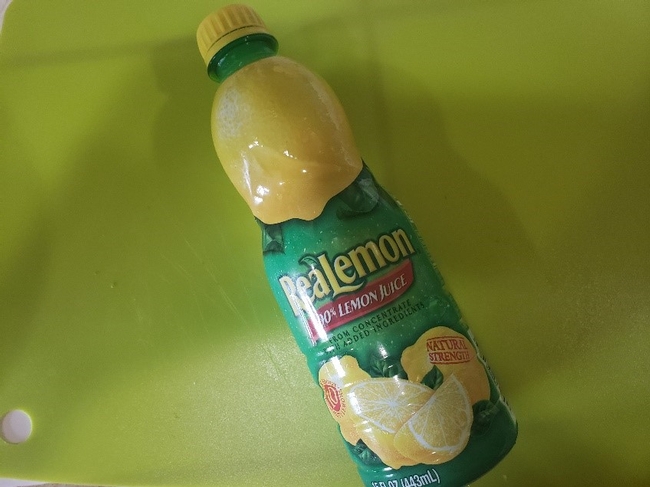 Bottle of commercially prepared lemon juice