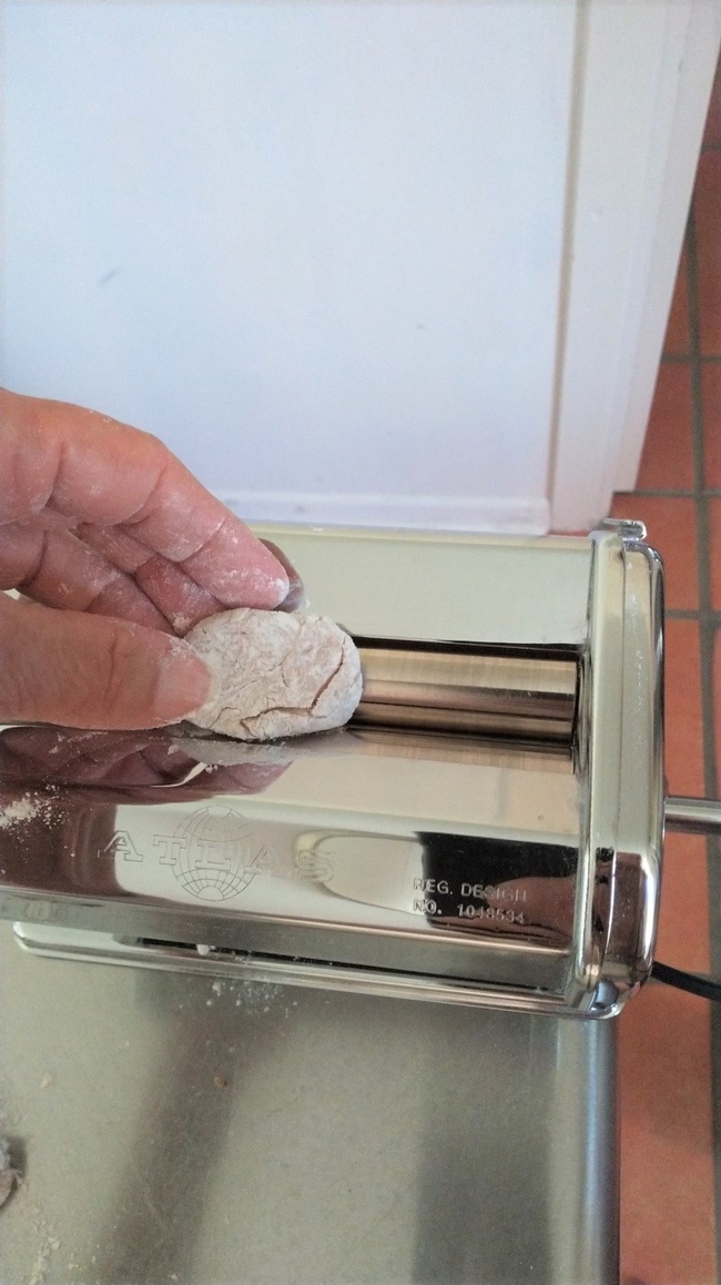 Dough piece placed on pasta machine(1)