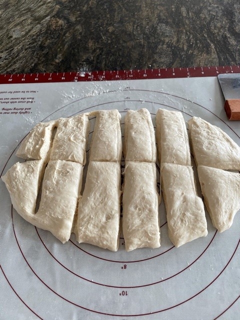 Pretzel dough flattened divided