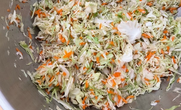 Coleslaw mixed with syrup.