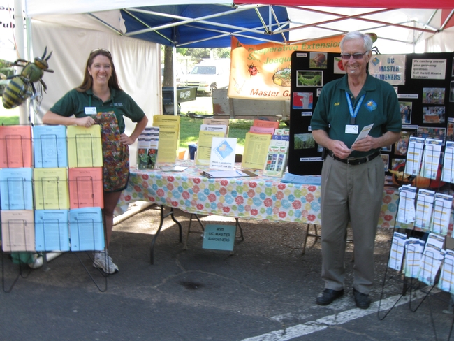 UC Master Gardener volunteer and coordinator answering questions at a local Farmer's Market. Photo Credit: UCCE Master Gardener Program of San Joaquin County