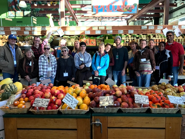 Local farmers tour Sebastopol's Community Market during a UCCE Tour to Meet Buyers in December