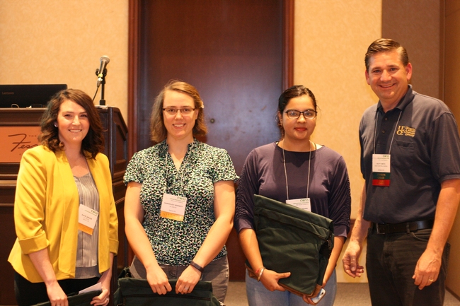 CWSS Student Poster Winners. Pictured from Left to Right: Katie Driver, HannahJoy Kennedy, Priyanka Chaudhari, and CWSS Director/Student Liaison Scott Oneto