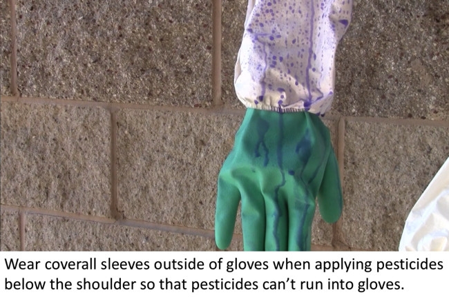 Liquid dripping on coverall sleeves shows that it cannot get into gloves if gloves are tucked into sleeves.