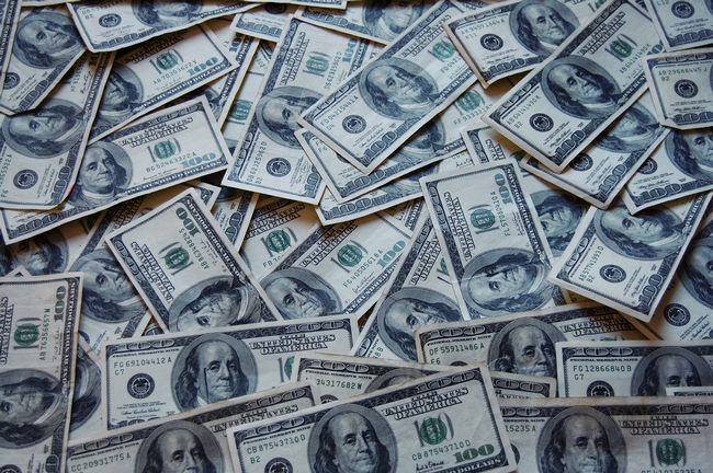 Photo of many $100 bills