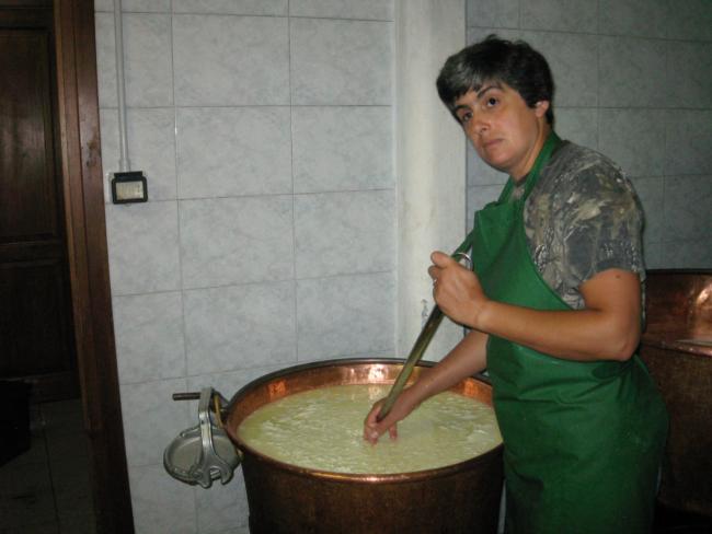 Sabina making Toma, Valle Pellice, Italy