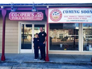 Dennis Cooper and son in front of Cooper's Public Market