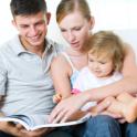 parents reading to toddler