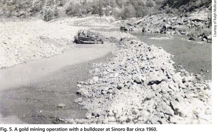 A gold mining operation with a bulldozer at Sinoro Bar circa 1960.