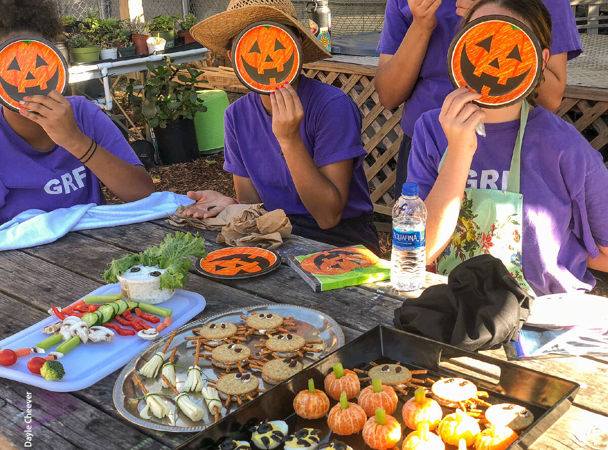 Young women at the County of San Diego Girls Rehabilitation Facility, participating in a UC Master Gardener project, get in the Halloween spirit.
