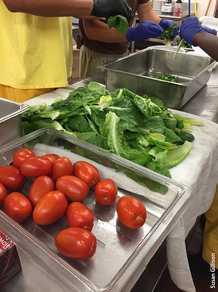 Incarcerated youth at the Kings County Juvenile Center prepare food grown on site.