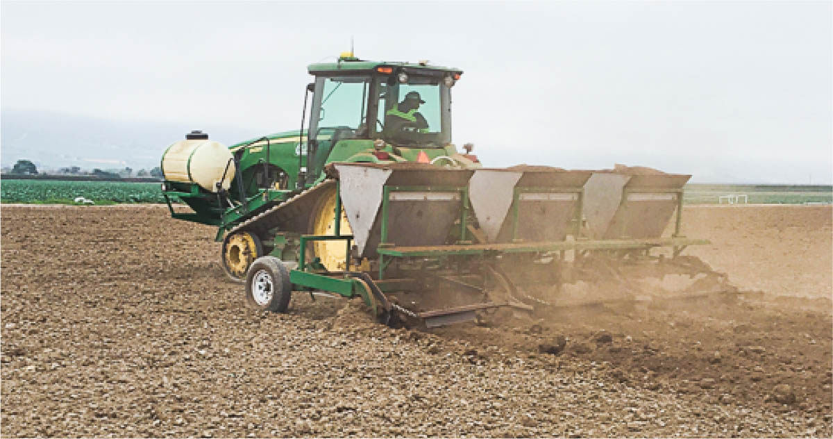 Tractor applying fertilizer. Photo: Richard Smith.