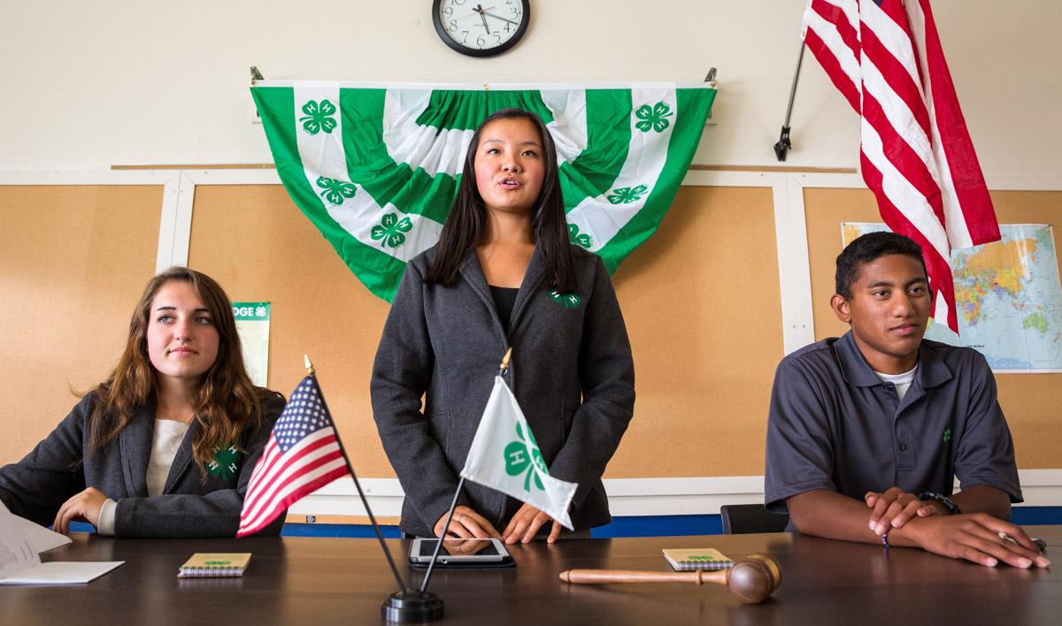 Youth speak at a 4-H club meeting. The low-stakes environment is an essential component in helping boost young people's public speaking confidence. Photo: National 4-H Council.