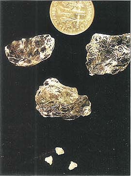 Dime indicates approximate size of dry versus water-filled polymer crystals.