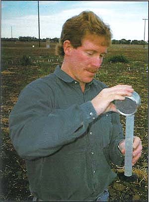 Above, water collected during monitoring of drip tape is measured.