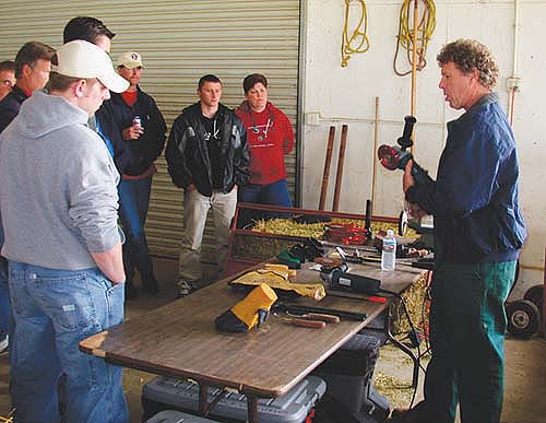 UC Cooperative Extension dairy specialist Steven Berry discusses tools used in the proper care of cow hoofs.