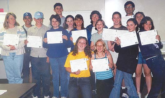 4-H teen teachers and adult volunteer leaders who completed the Animal Ambassadors training and implementation project in San Luis Obispo County display their diplomas.