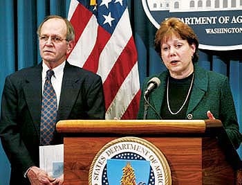 On Dec. 23, 2003, then-U.S. Agriculture Secretary Ann Veneman (right) and USDA Undersecretary Bill Hawks briefed the media regarding the slaughter of an animal with BSE from rural Washington state.