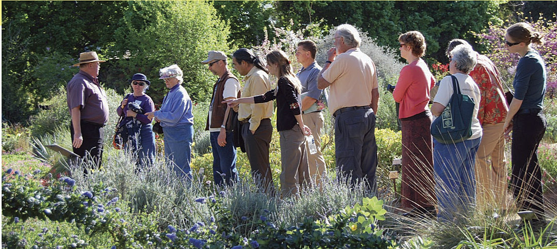 Superintendent Warren Roberts (far left) led a tour in April of the Storer Garden for California Secretary of Agriculture A.G. Kawamura (fifth from left) and other friends of the PlantRight program.