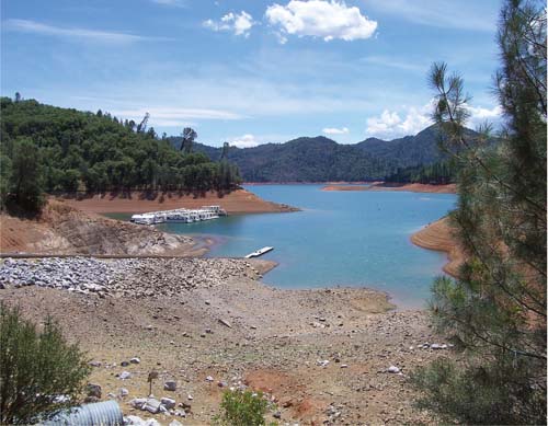In a warmer world, the availability of water is likely to be the most important issue that Californians face. Reservoirs such as Shasta in Northern California, shown in fall 2008 at nearly 60% of its capacity, will likely be fuller in winter, and lower in spring and summer when crops are irrigated.