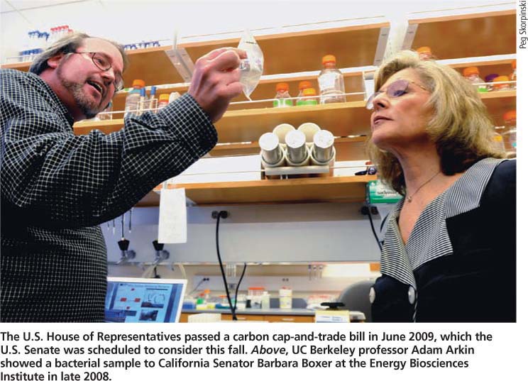 The U.S. House of Representatives passed a carbon cap-and-trade bill in June 2009, which the U.S. Senate was scheduled to consider this fall. Above, UC Berkeley professor Adam Arkin showed a bacterial sample to California Senator Barbara Boxer at the Energy Biosciences Institute in late 2008.