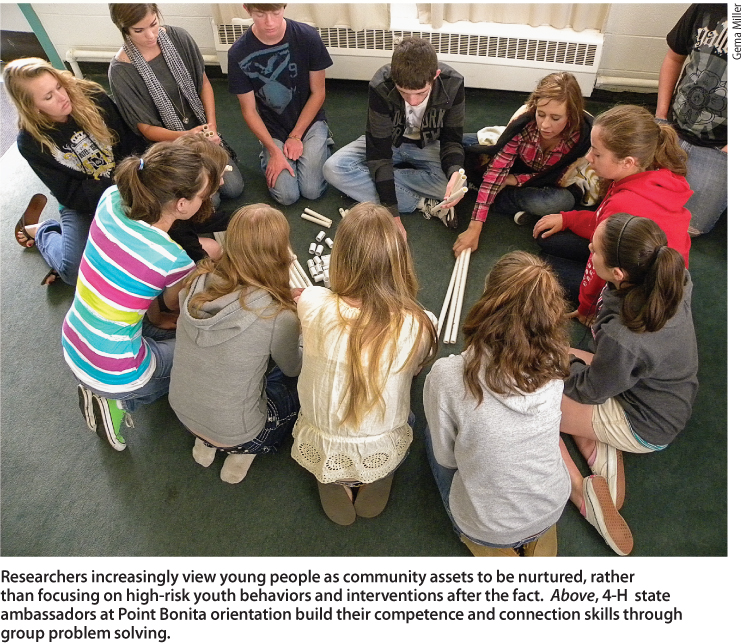 Researchers increasingly view young people as community assets to be nurtured, rather than focusing on high-risk youth behaviors and interventions after the fact. Above, 4-H state ambassadors at Point Bonita orientation build their competence and connection skills through group problem solving.