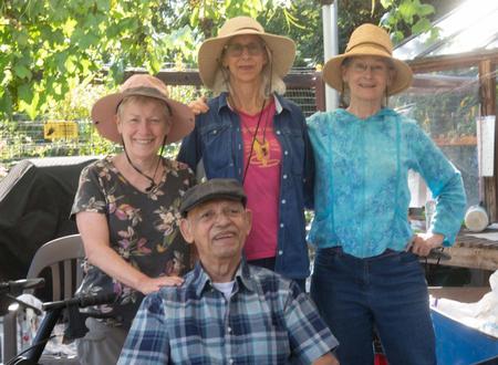 Photo by Fred Teensma. Longtime UC Master Gardener Prabhakar Sathe is surrounded by Mary Jo Corby, Leesa Evans and Robannie Smidebush.