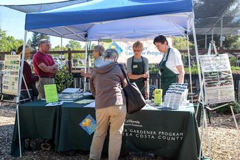 UC Master Gardeners answer questions at an AAMG booth. Photo by UC Master Gardener